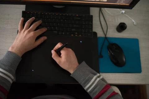 Graphic designer at work top view Young graphic designer working on a digi... Stock Photos