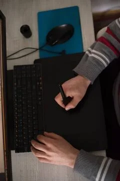 Graphic designer at work top view Young graphic designer working on a digi... Stock Photos