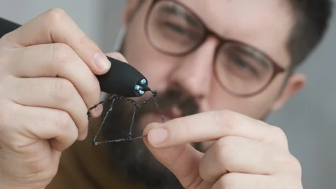 Graphic designer working with 3d pen. Stock-Footage 104273353