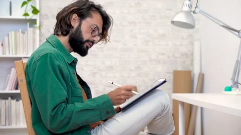 Graphic designer working with computer digital tablet stylus pen smartphone at Stock-Footage 222614784