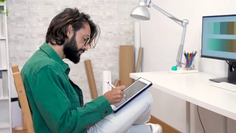 Graphic designer working with computer digital tablet stylus pen and color Stock-Footage 234819489