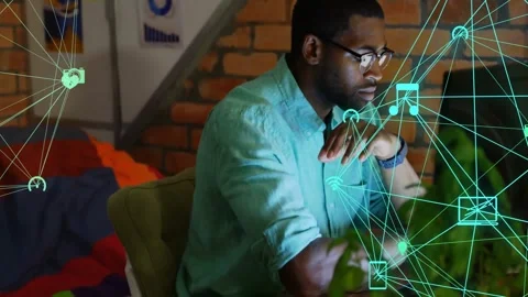 Graphic designer working at desk in cozy tech workspace, showing laptop wifi Stock Footage 326752582