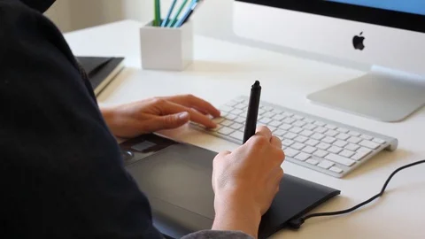 Graphic Designer Working With Digital Drawing Tablet Stock Footage 127885277