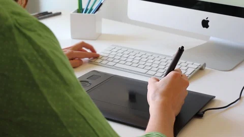 Graphic Designer Working With Digital Drawing Tablet Stock Footage 127885302
