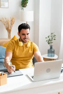 Graphic designer working from home. Stock Photos