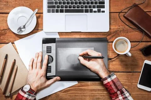 Graphic Designer working with interactive pen display, digital Drawing tablet Stock Photos