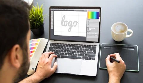 Graphic designer working on laptop Stock Illustration