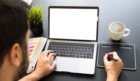 Graphic designer working on laptop Stock Illustration
