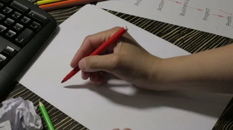 Graphic designer writes the word Stock Footage 63034217