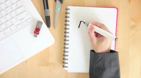 Graphic Designer Writing Idea On Notebook With Felt Pen Marker Office Desktop Video stock 65816563