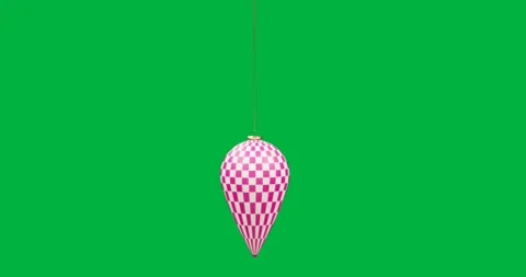 Graphic designers adding cone-shaped checkerboard ornament in design file, with Stock Footage 317595676