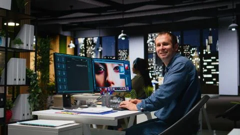 Graphic developer working with photo editing software at the office Foto stock