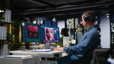 Graphic developer working with photo editing software at the office Foto stock