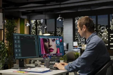 Graphic developer working with photo editing software at the office Foto stock