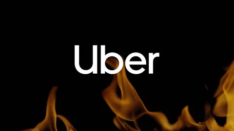 Graphic editorial of Uber icon burning in the fire on black background Stock Footage 148390008