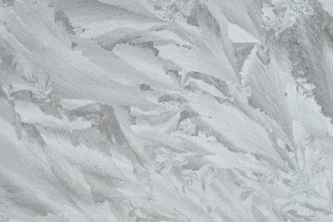 Graphic pattern on the frosted winter window Stock Photos