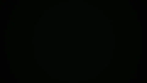 Graphic Pattern of Purple and Green Crosses Pulsing on a Black Background Stock Footage 343707695