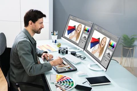 Graphic Photo Designer Using Computer Screen Stock Photos