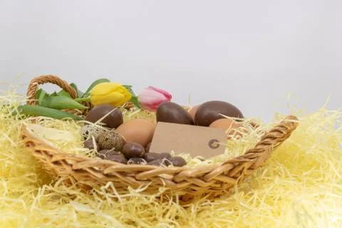 Graphic resource with blank label, Easter theme and the arrival of spring Stock Photos