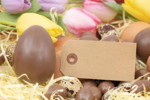 Graphic resource for Easter and the arrival of spring with chocolate and tulips Stock Photos