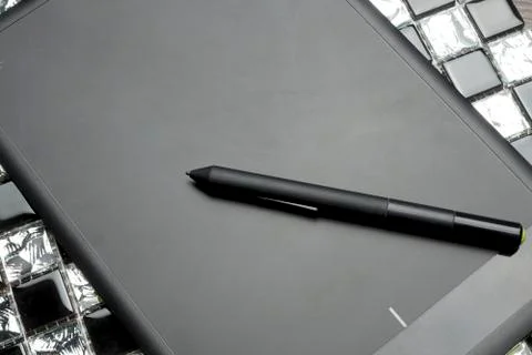 Graphic tablet on a table. Stock Photos