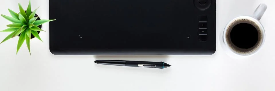 Graphic tablet on a white empty background. Copy space. Stock Photos
