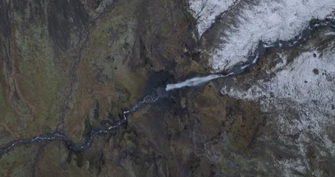 Graphic Top View of Iceland Waterfall and Snow Edge Stock Footage 328962600