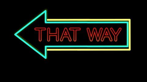 Graphical, flickering neon sign of arrow facing left with title 'THAT WAY!' Stock Footage 339087662