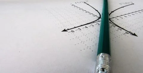 Graphical representation of math functions and a pencil Stock Photos