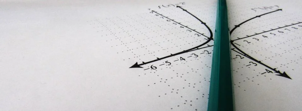 Graphical representation of math functions and a pencil Stock Photos