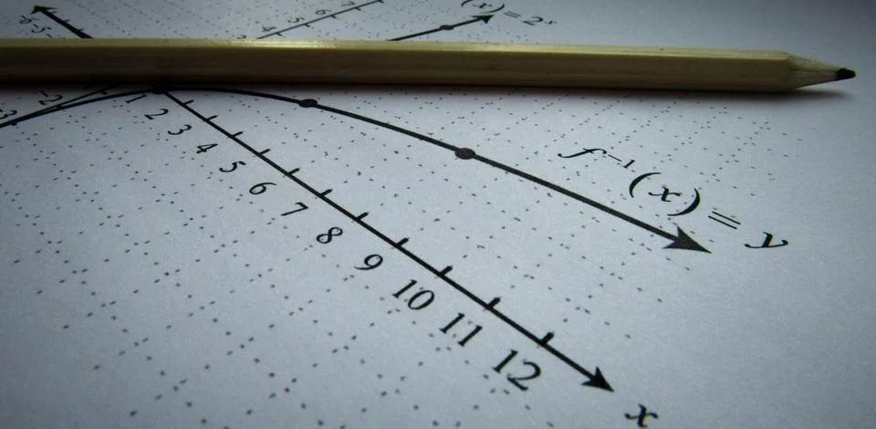 Graphical representation of math functions and a pencil Stock Photos