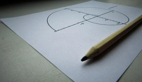Graphical representation of math functions and a pencil Foto stock