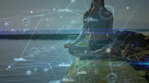 Graphics appearing and camera zooming out revealing meditating woman showing Stock Footage 313094406