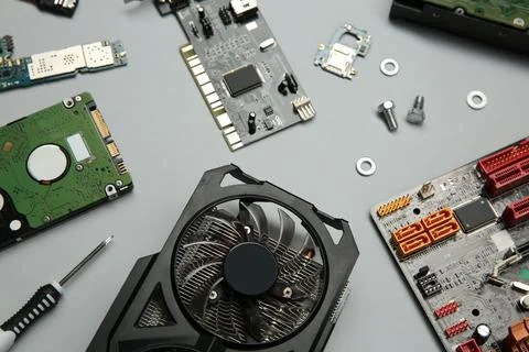 Graphics card and other computer hardware on light background, above view 写真素材