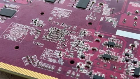 Graphics card circuit board close-up with microchips and components Stock Footage 342575465