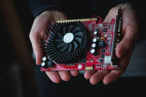 Graphics Card Held In Human Hands 库存照片