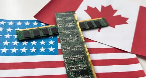 Graphics card with processor and microchip with flags of the USA and Canada.. Stock Photos