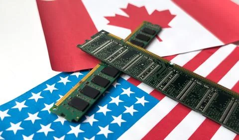 Graphics card with processor and microchip with flags of the USA and Canada.. Stock Photos