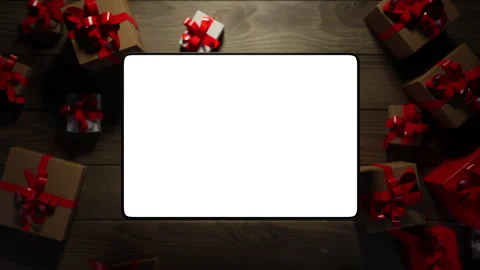 A graphics tablet rises above the table, displaying information. the animatio Stock Footage 260982204