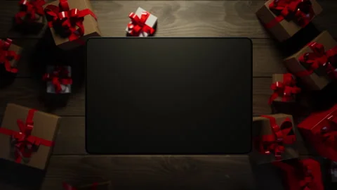 A graphics tablet rises above the table, displaying information. Stock Footage 260982482