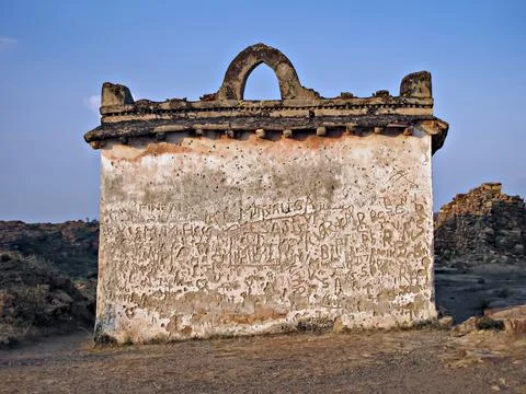 Graphity done on ancient wall in Badami fort , Karnataka , India. Stock Photos