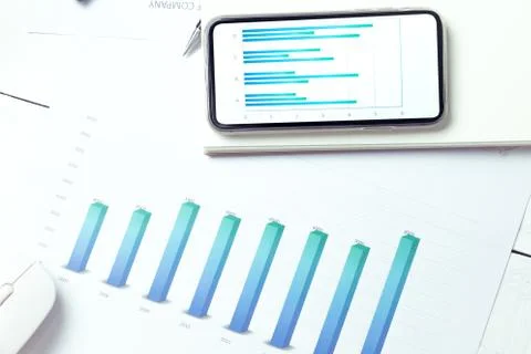 Graphs and charts elements on phone screen  and statistical performance of th Stock Photos