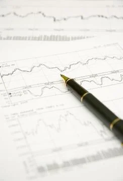 Graphs and pen Stock Photos