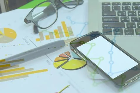 Graphs and pen Stock Photos