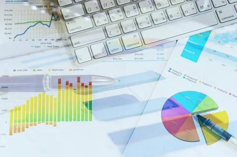 Graphs and pen Stock Photos