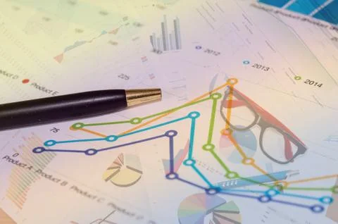 Graphs and pen Stock Photos