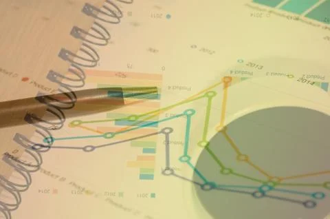 Graphs and pen Stock Photos