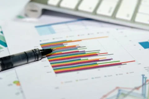 Graphs and pen Stock Photos