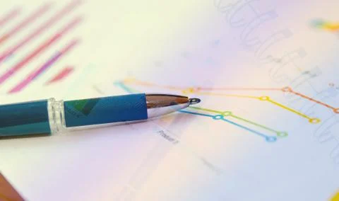 Graphs and pen Stock Photos