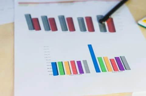 Graphs and pen Stock Photos